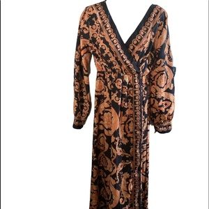 Long sleeve filigree gown with slit